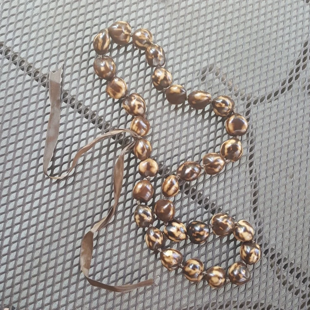 Hawaiian Kukui nut necklace.
